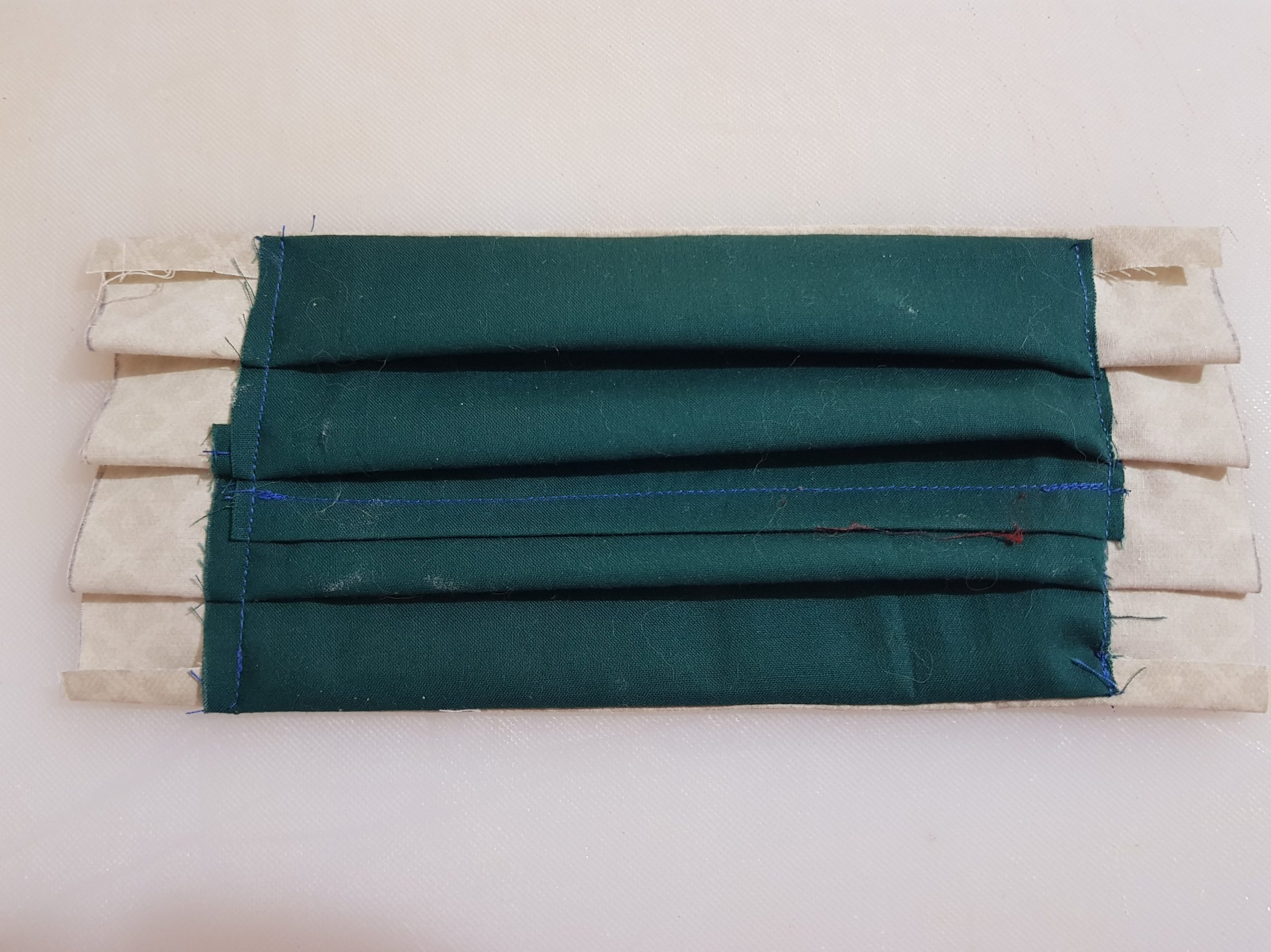 mask after sewing the folds in place